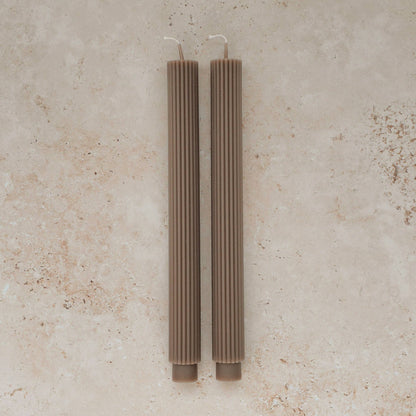 Sunday Edition's Roman Taper Candles in Taupe.