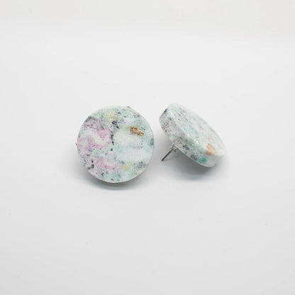 Round seafoam earrings in polymerized recycled foam, titanium posts.