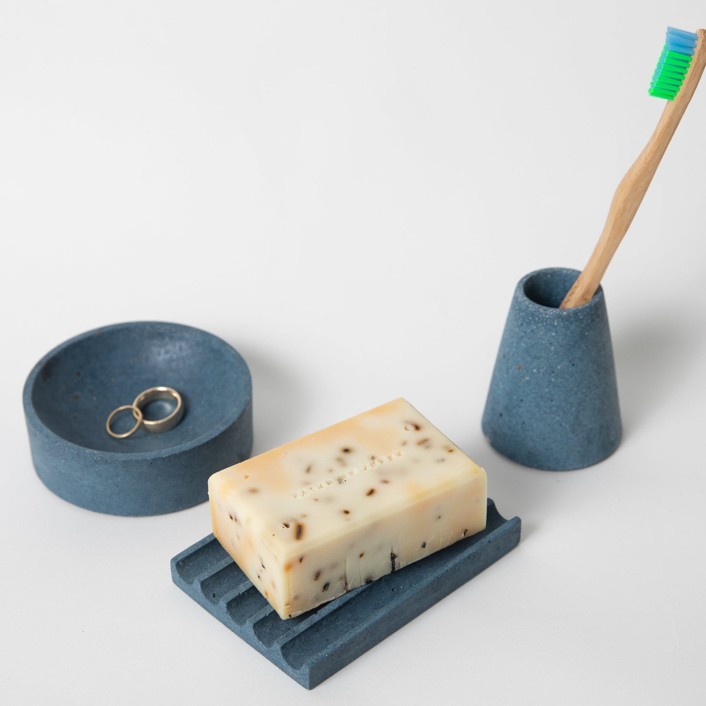 Soap dish, toothbrush holder, and a 4" catch all in cobalt terrazzo.