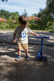 Geo Toddler Tee on Aaron in Cream w/ Cobalt