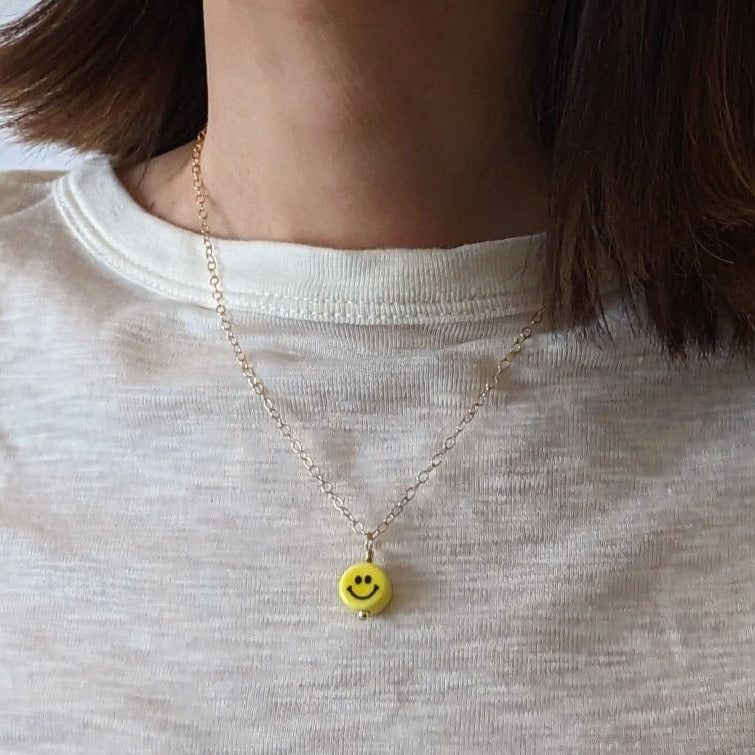 Smiley Charm Necklace on model