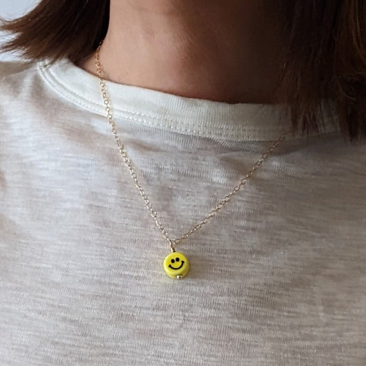 Smiley Charm Necklace on model