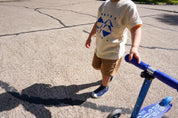 Geo Toddler Tee on Aaron in Cream w/ Cobalt