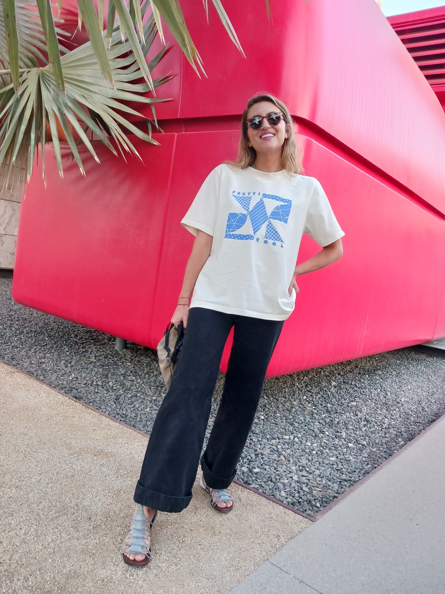 Memphis Tee in cream w/ blue print on model.