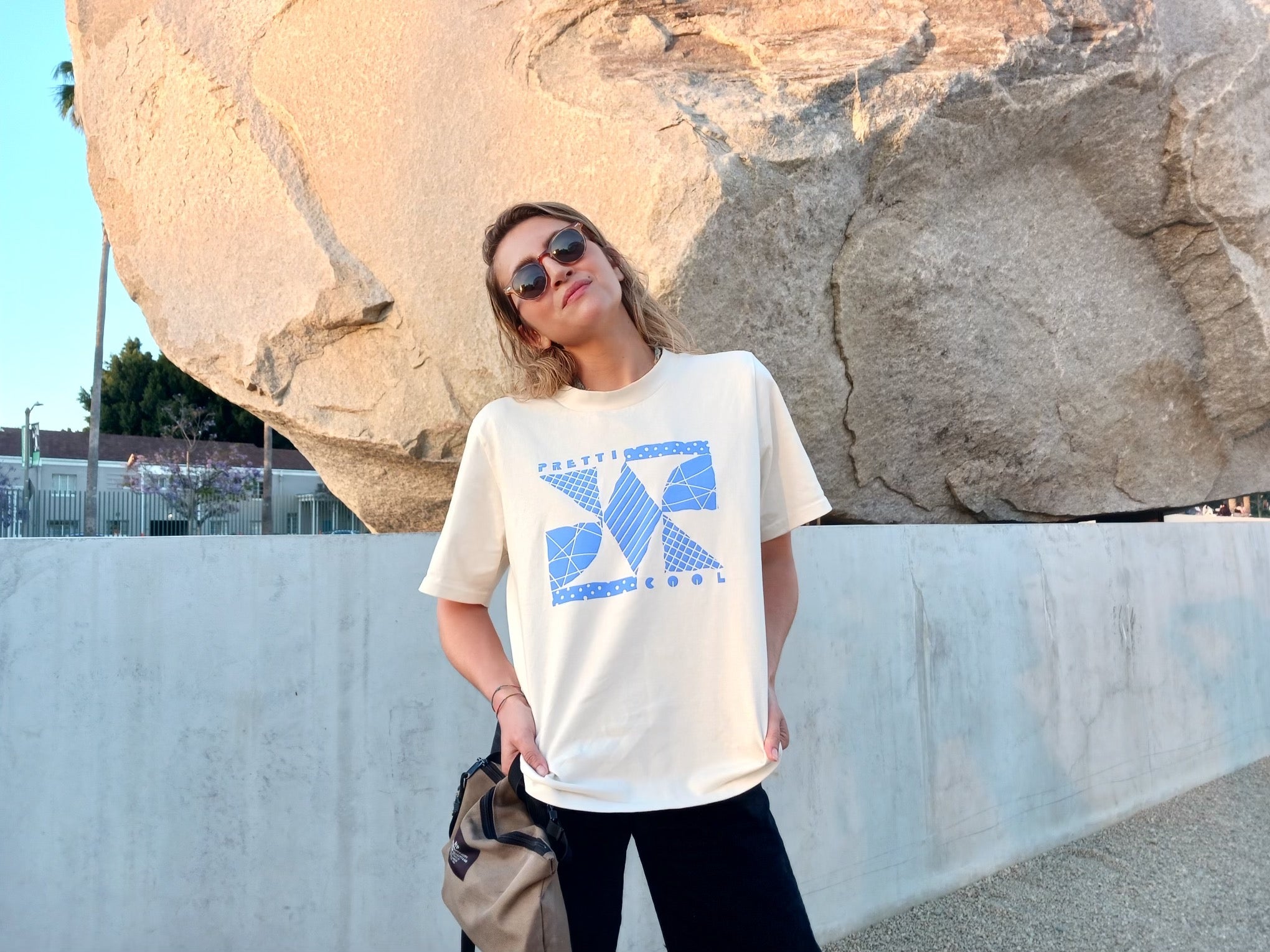 Memphis Tee in cream w/ blue print on model.