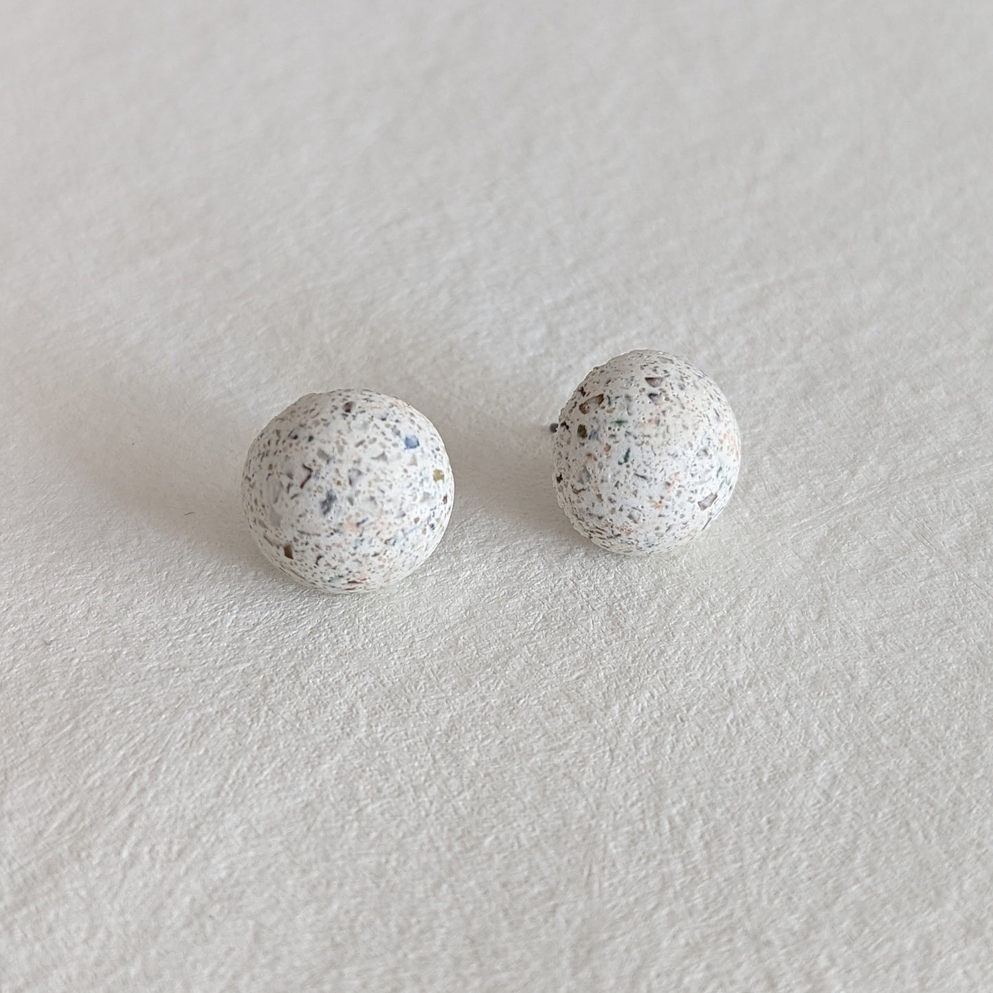 Pretti.Cool's Dome Earrings in White Terrazzo.