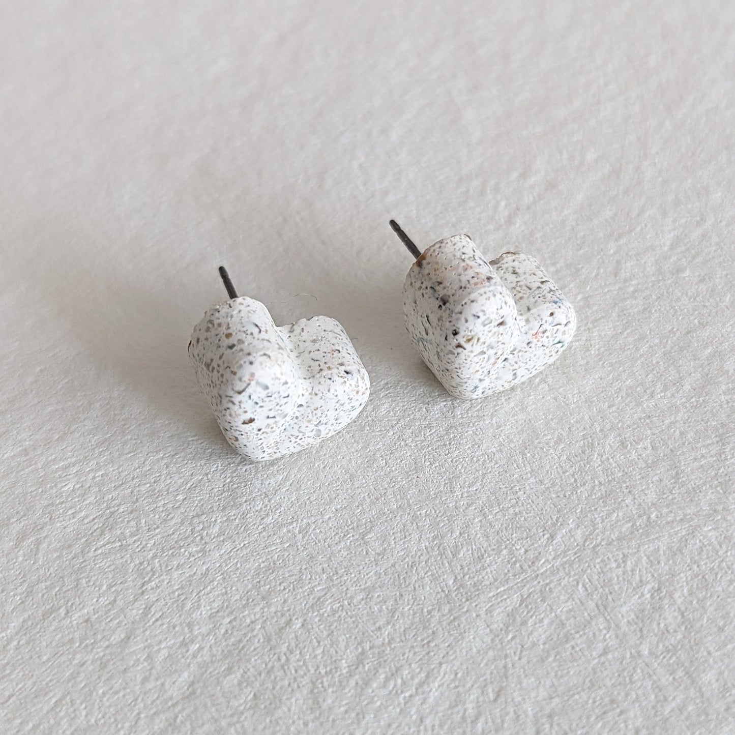 Pretti.Cool's Chunky Heart Earrings in White Terrazzo.