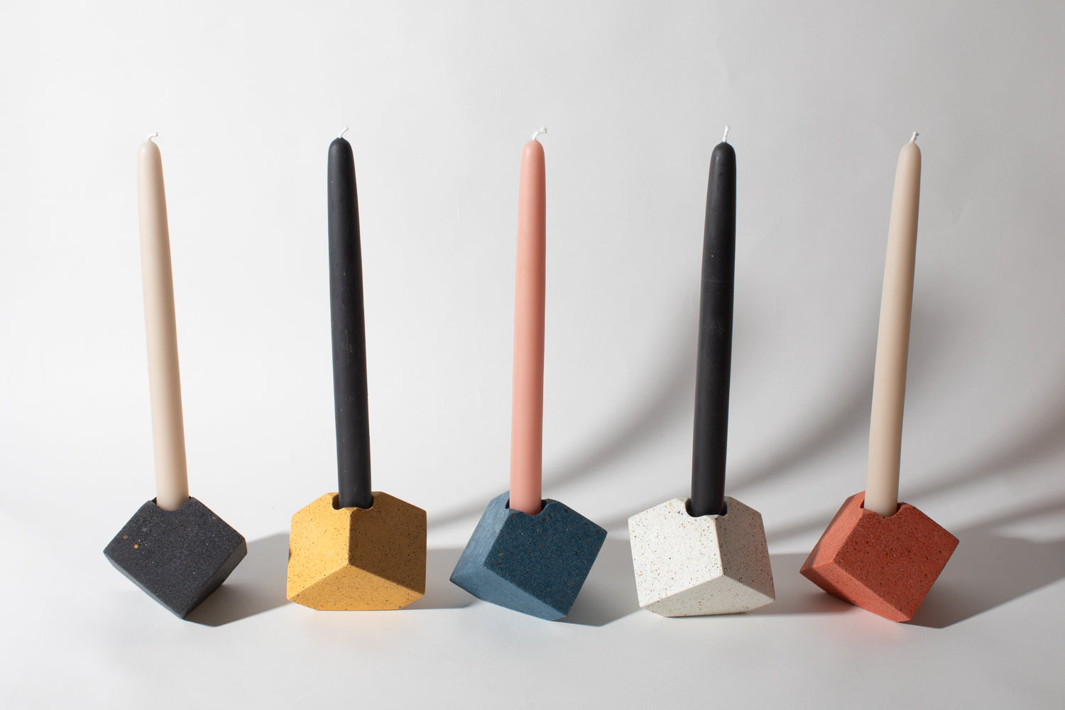 Pretti.Cool Block Candlestick Holders - Cube in all five colors with candlesticks.