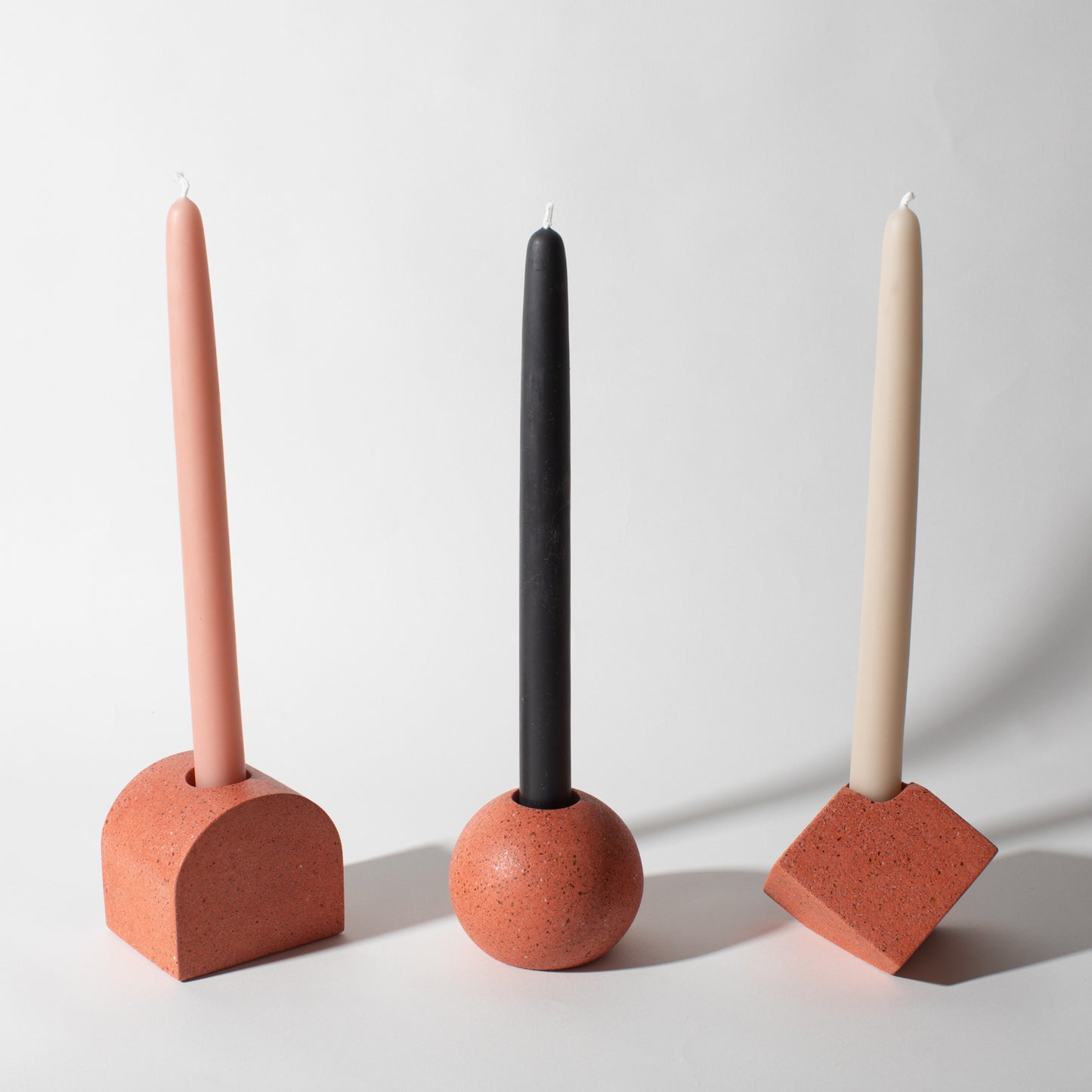 Pretti.Cool Block Candlestick Holder Set in Coral Terrazzo w/ candlesticks.