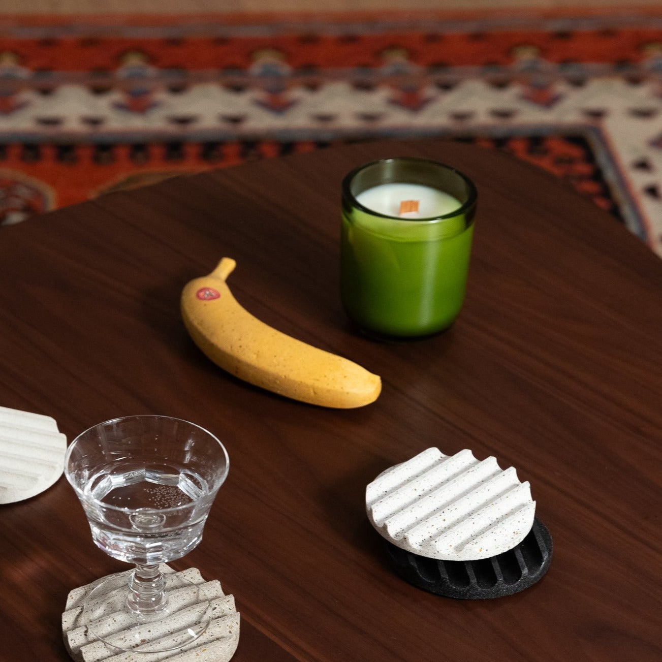 Terrazzo Neutral coaster set, paired with a Perfectly Ripe banana, & a 10oz. candle.