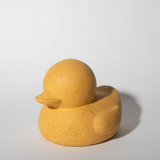 Large "rubber" ducky in marigold terrazzo.