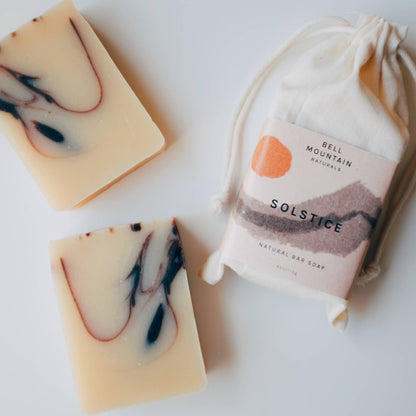 Bell Mountain Naturals' Solstice soap bars, shown next to its packaging.