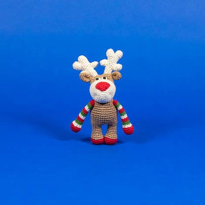 Hand knit reindeer dog toy.