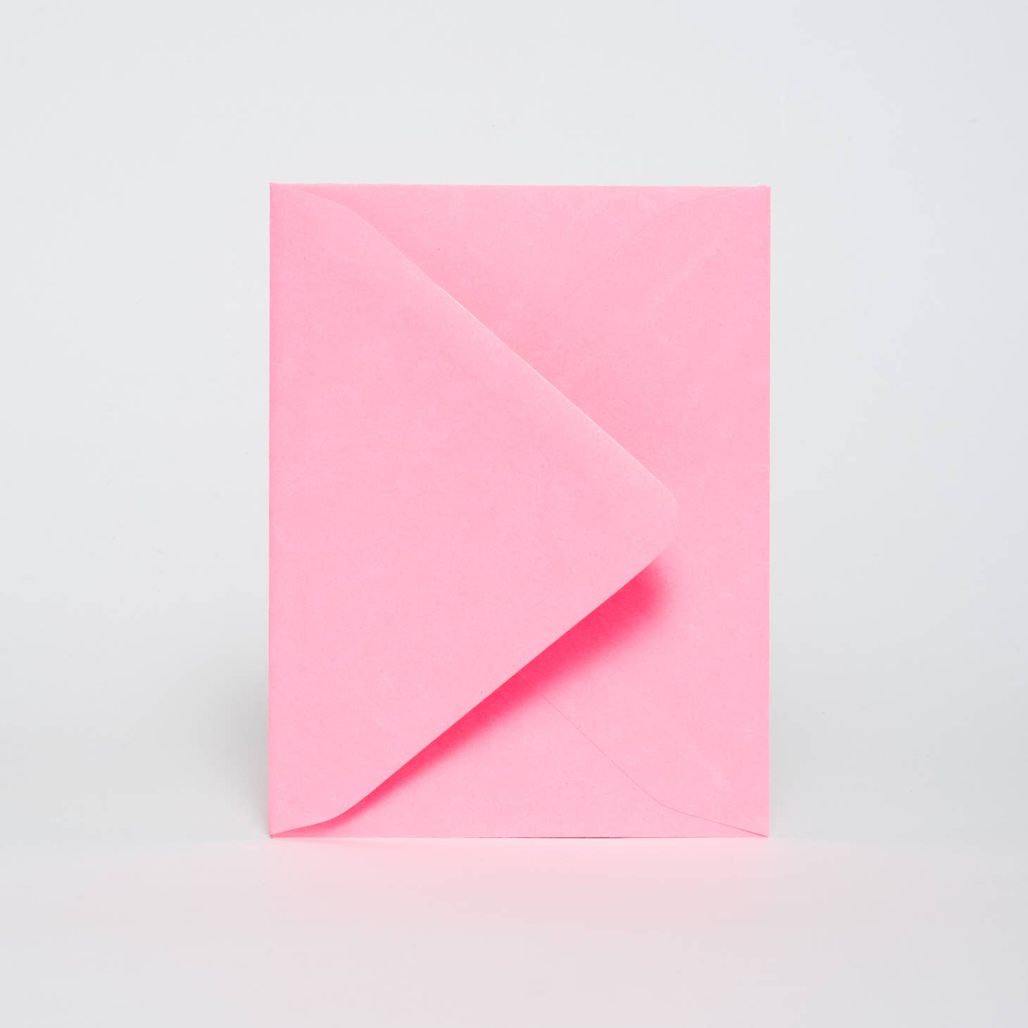 The included envelope for the card comes in florescent pink.