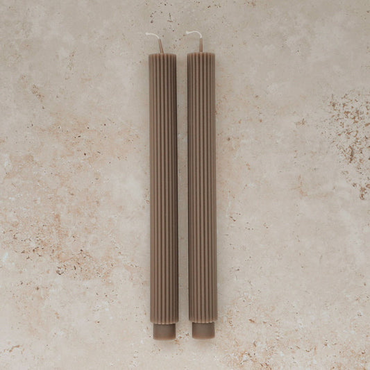 Sunday Edition's Roman Taper Candles in Taupe.