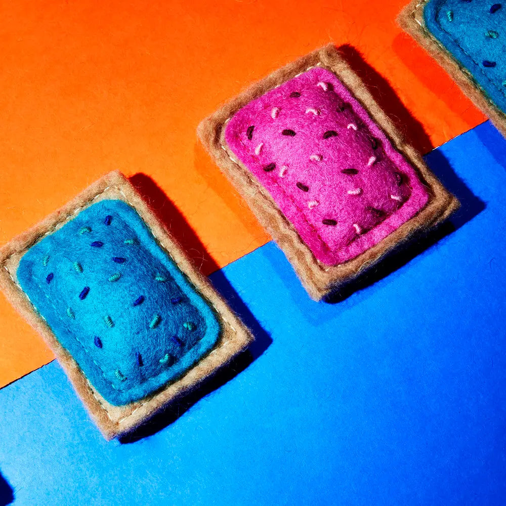 Ware of the Dog's Wool Pop Tart Cat Toy in Blueberry and Strawberry.