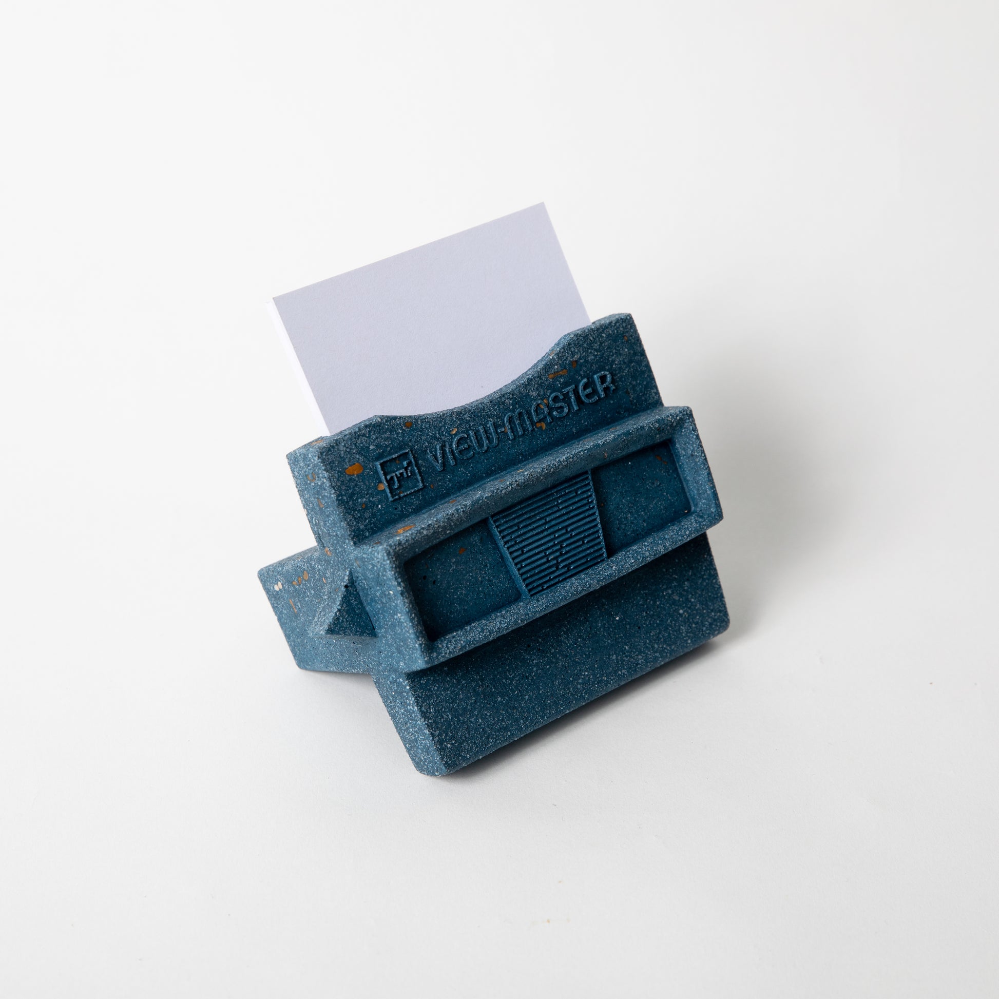 The Retro Business Card Holder in Cobalt Terrazzo w/ blank business cards placed inside.