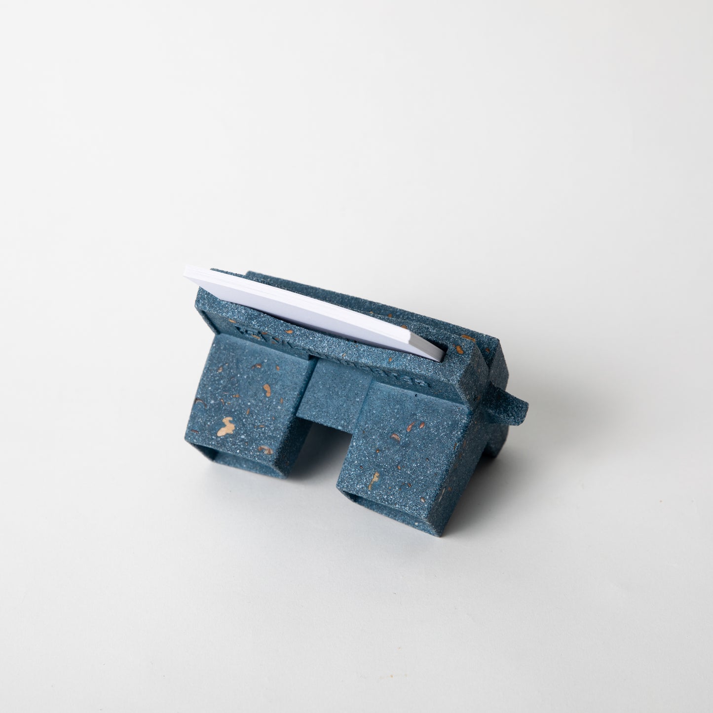 The Retro Business Card Holder in Cobalt Terrazzo w/ blank business cards placed inside.