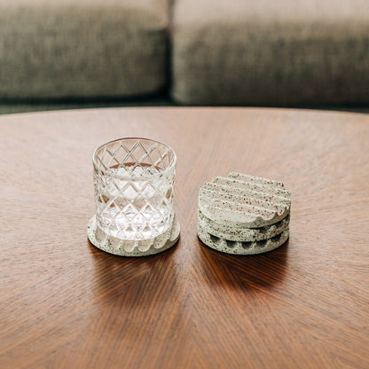 Terrazzo concrete coaster set in white. Seen on coffee table with fancy glass. Sold in set of 2 or 4.