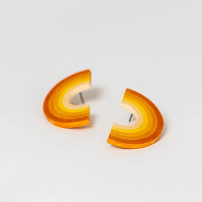  Earrings made from compressed paper with a titanium stud in yellow and orange.