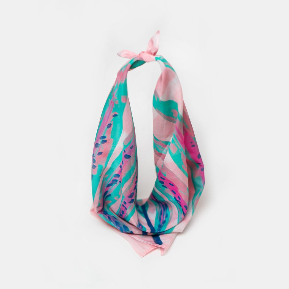Exclusive collaboration scarf with Seattle-based illustrator Jess Phoenix. Cotton/Silk Blend seen hanging. 