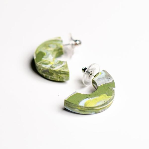 Earrings are a green polymer clay earring with surgical steel studs.