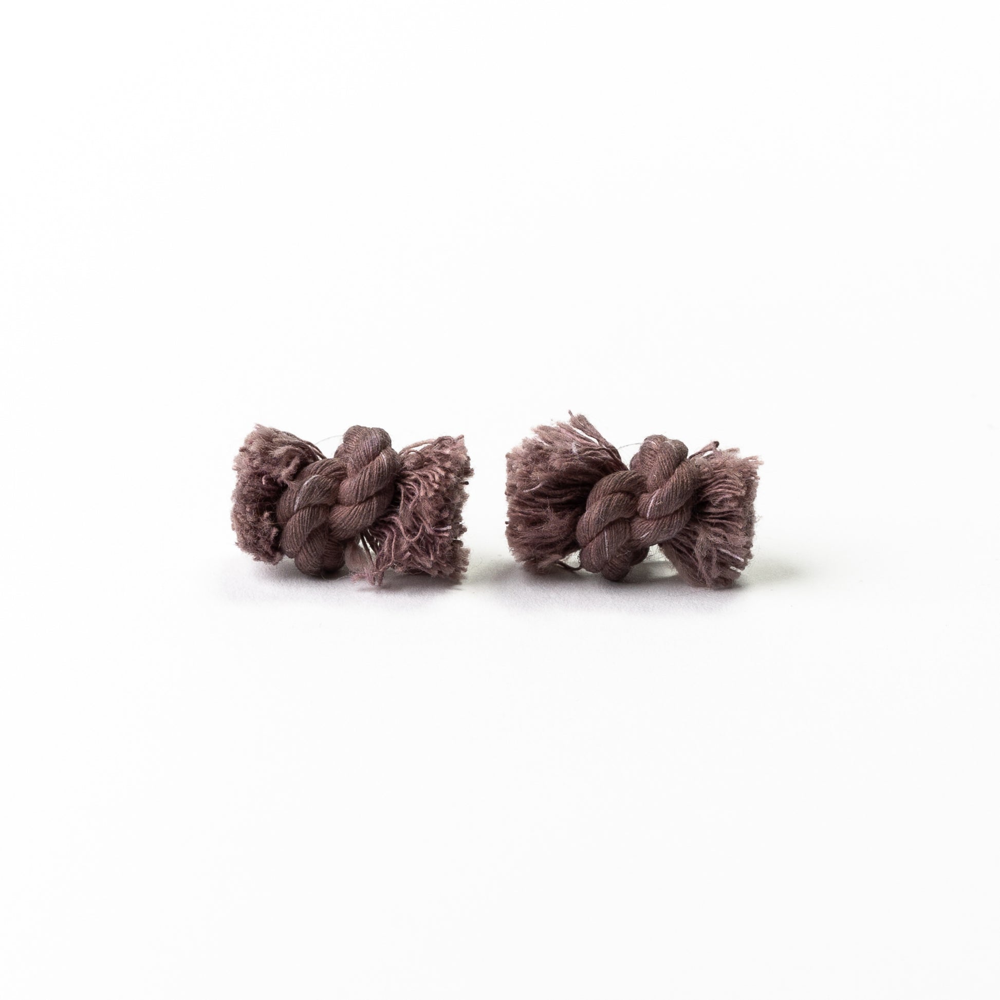 Dyed cotton rope knot earrings with titanium post in mauve.