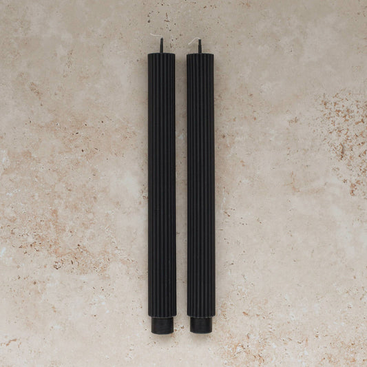 Sunday Edition's Roman Taper Candles in Nuit.