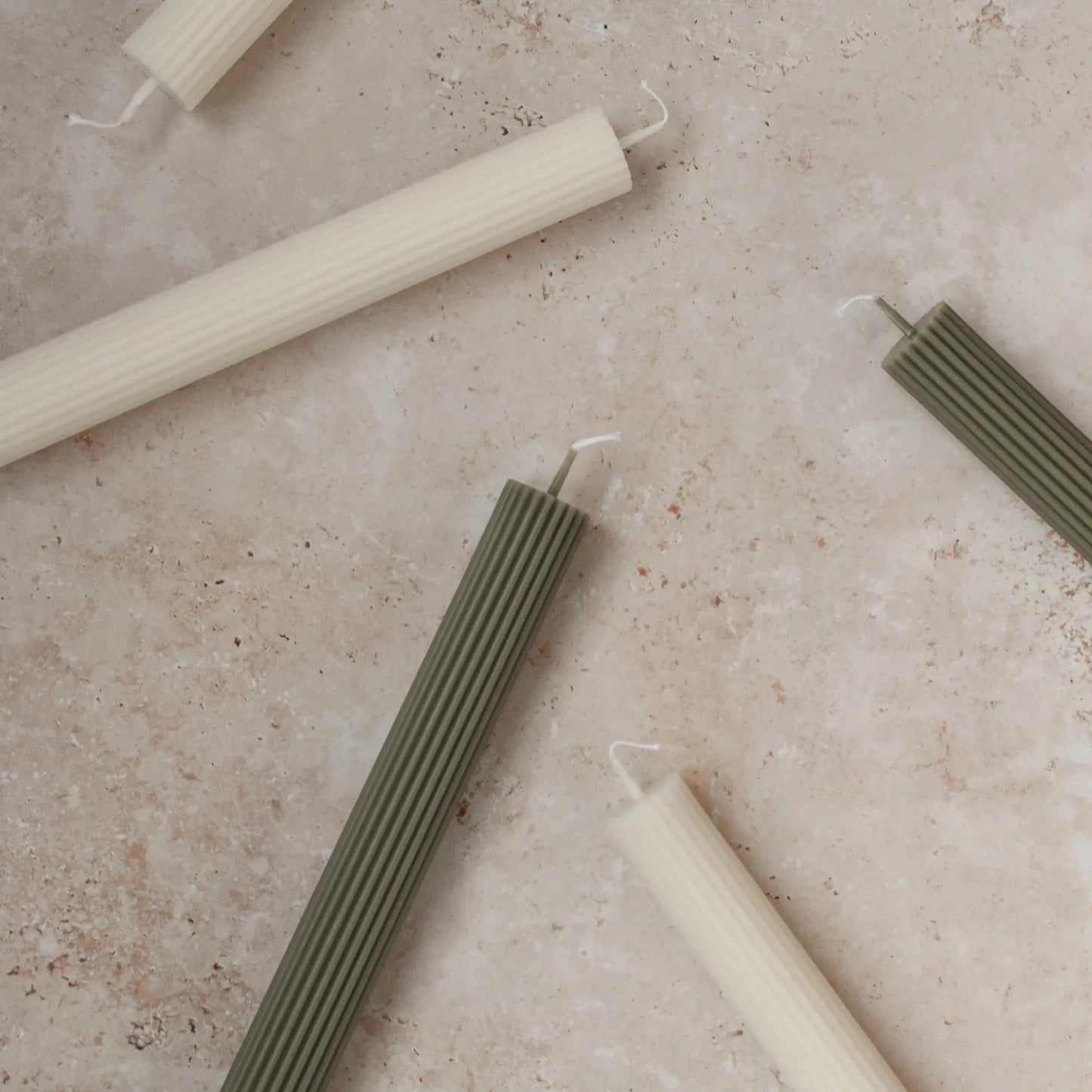 Sunday Edition's Roman Taper Candles in sage and cream.