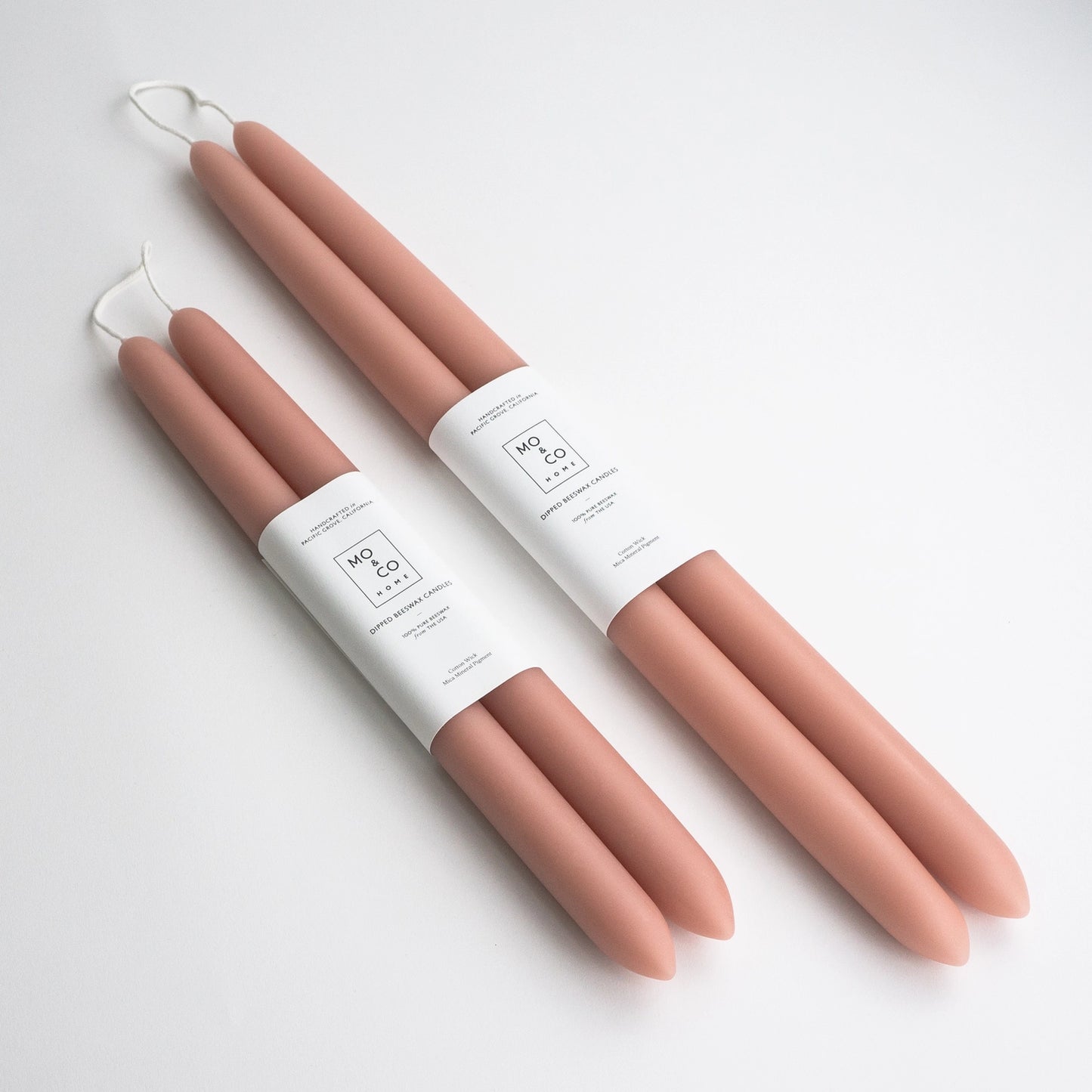 Mo&Co. Home Hand-Dipped Tapers in Terra Cotta.