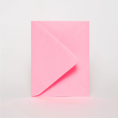 The included envelope for the card comes in florescent pink.