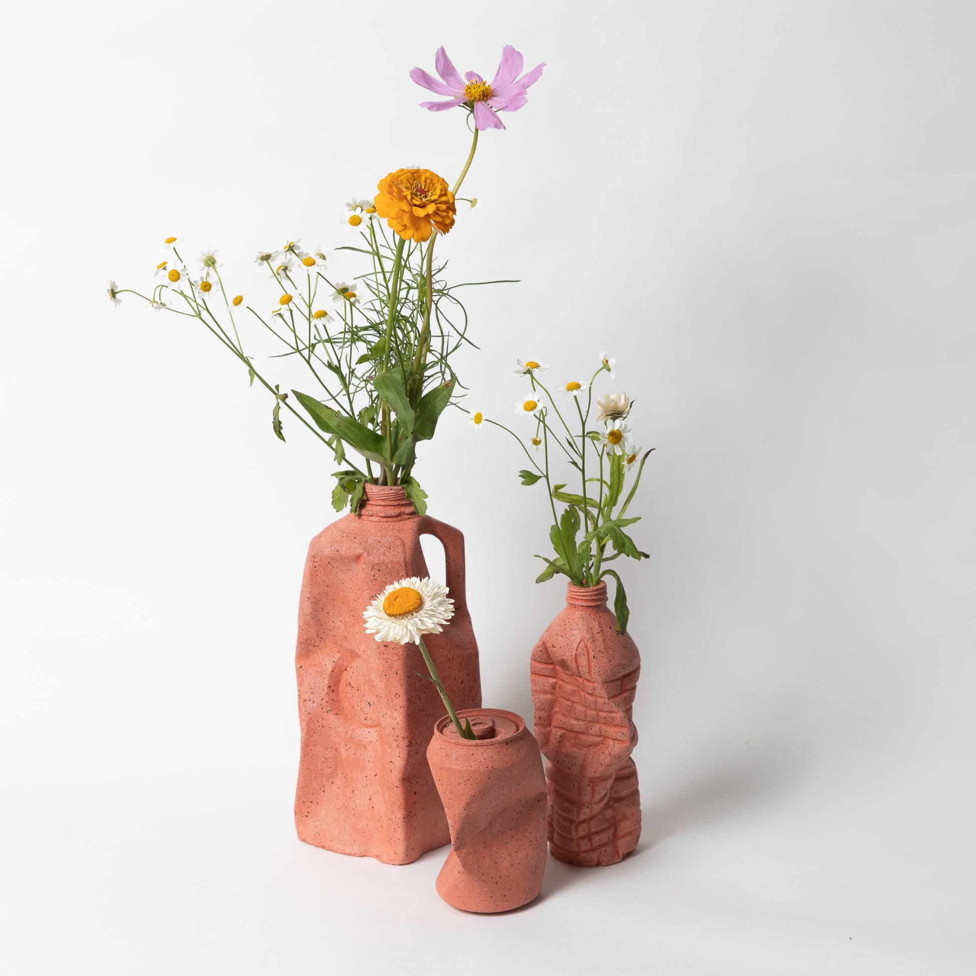 The coral terrazzo complete set of vases from our Garbage Collection.