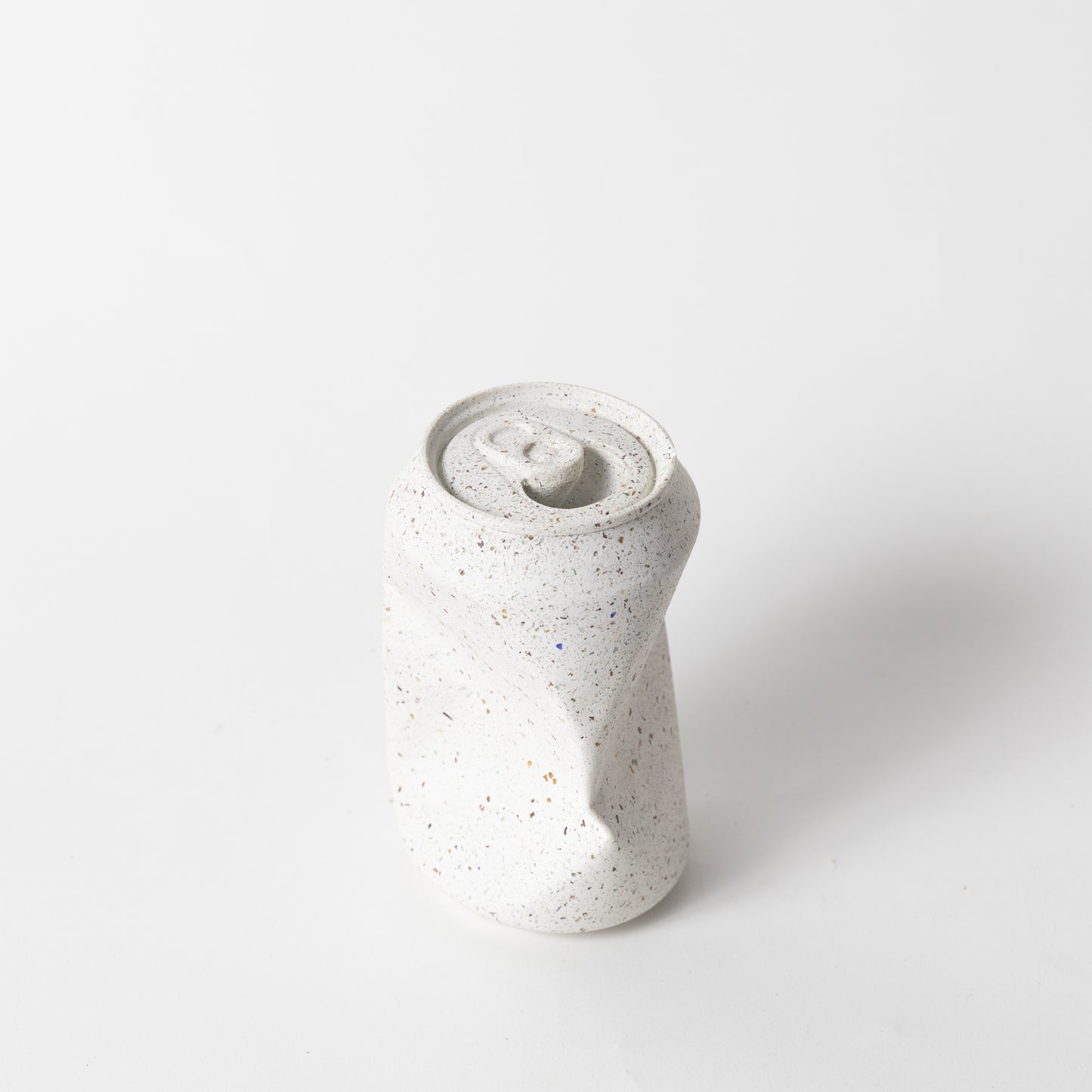 The white terrazzo soda can vase from our Garbage Collection.