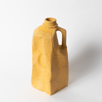 The marigold terrazzo milk carton vase from our Garbage Collection.