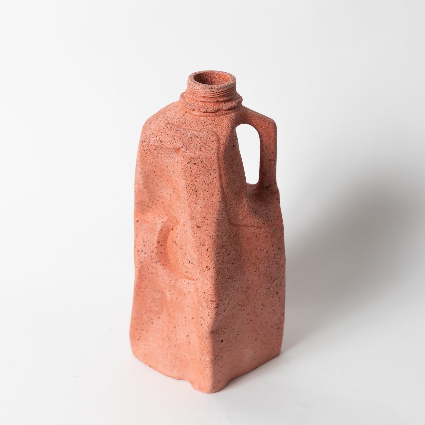 The coral terrazzo milk carton vase from our Garbage Collection.