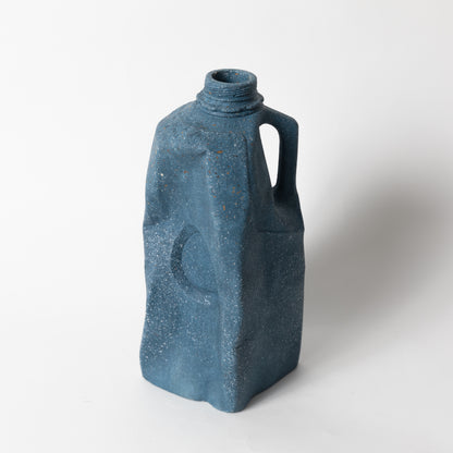The cobalt terrazzo milk carton vase from our Garbage Collection.