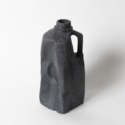 The black terrazzo milk carton vase from our Garbage Collection.