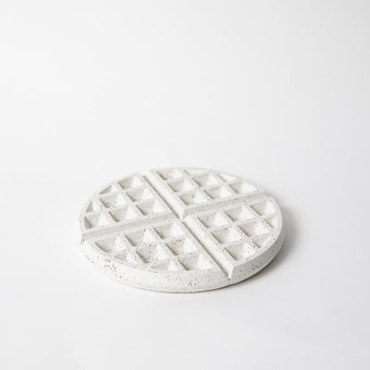 Concrete waffle shaped trivet in white