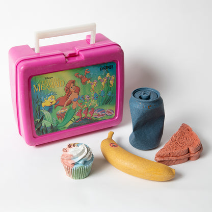 Set of concrete food shaped items with vintage Little Mermaid lunch box