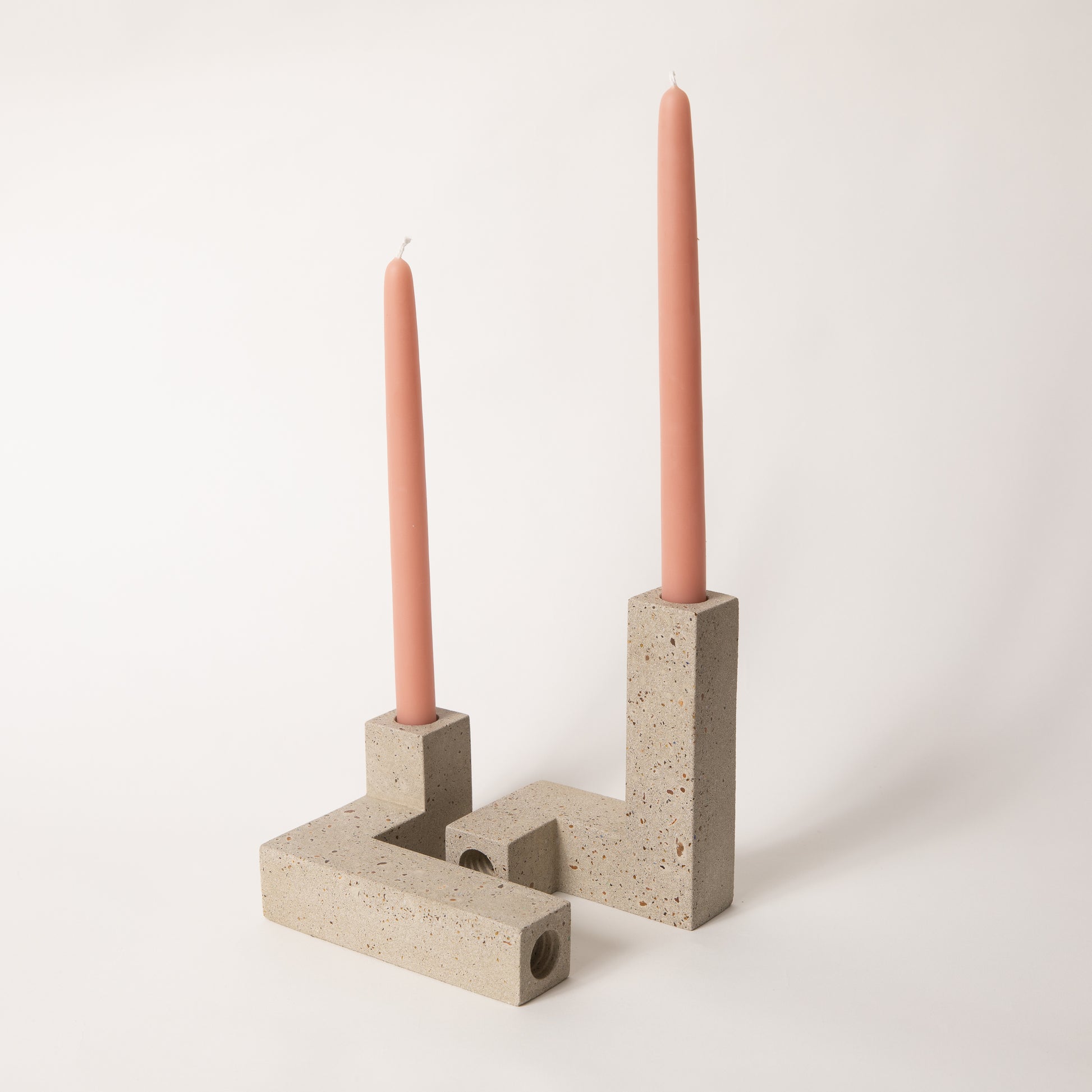 Mo&Co. Home Hand-Dipped Tapers in Terra Cotta, styled in our natural terrazzo candlestick set.