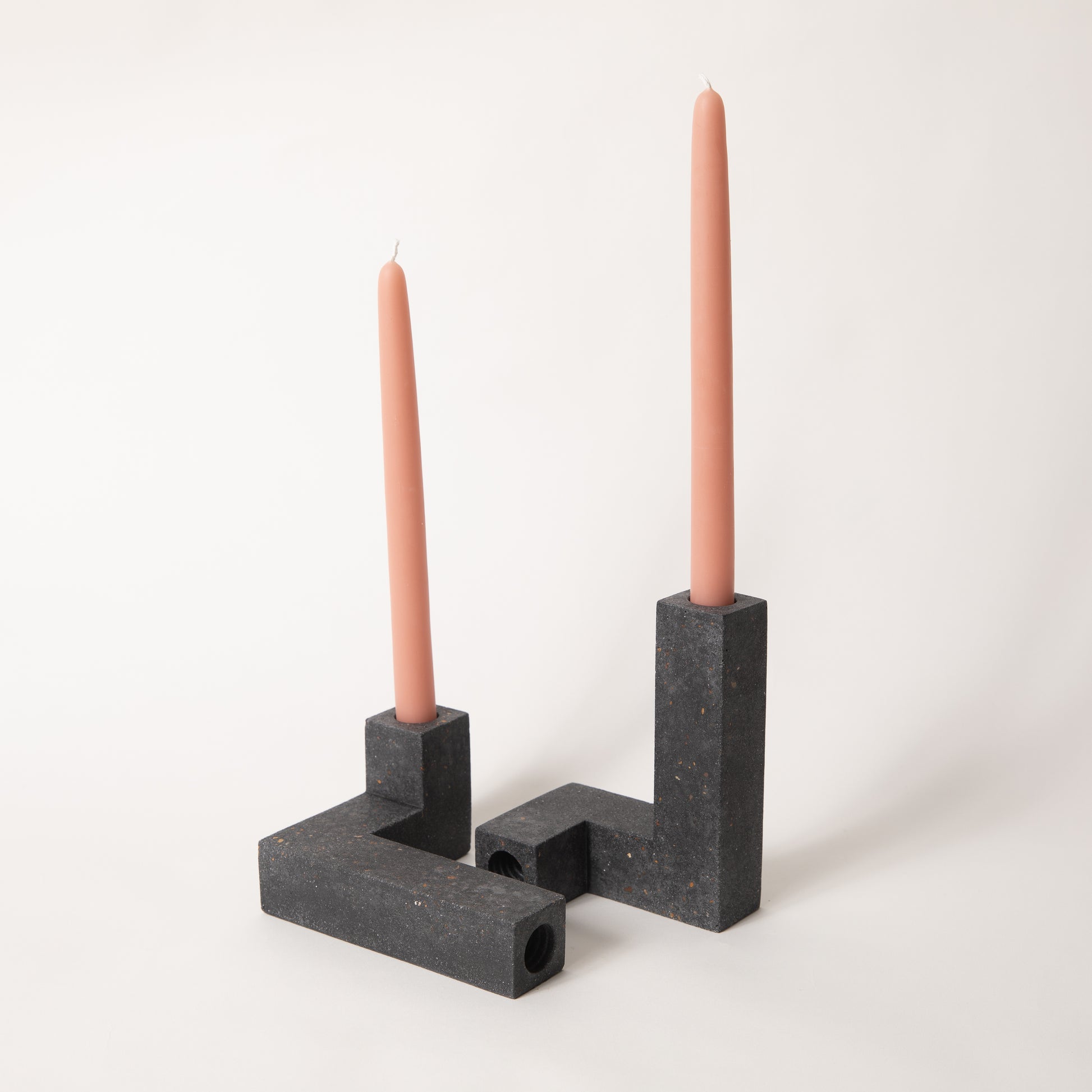 Mo&Co. Home Hand-Dipped Tapers in Terra Cotta, styled in our black terrazzo candlestick set.