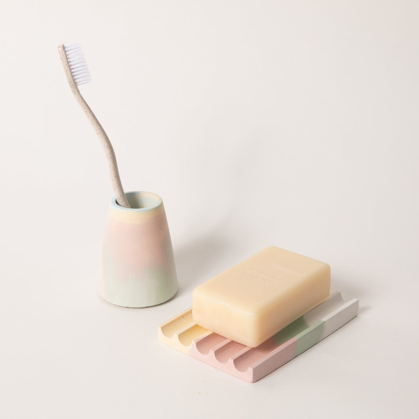 Jawbreaker toothbrush holder & soap dish set, styled with a toothbrush & bar of soap.
