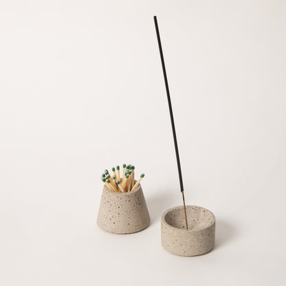 Natural terrazzo matchstick & incense holder set, styled with strike-anywhere matches & an incense stick.