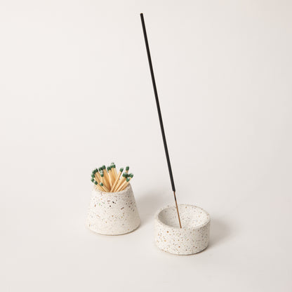 White terrazzo matchstick & incense holder set, styled with strike-anywhere matches & an incense stick.