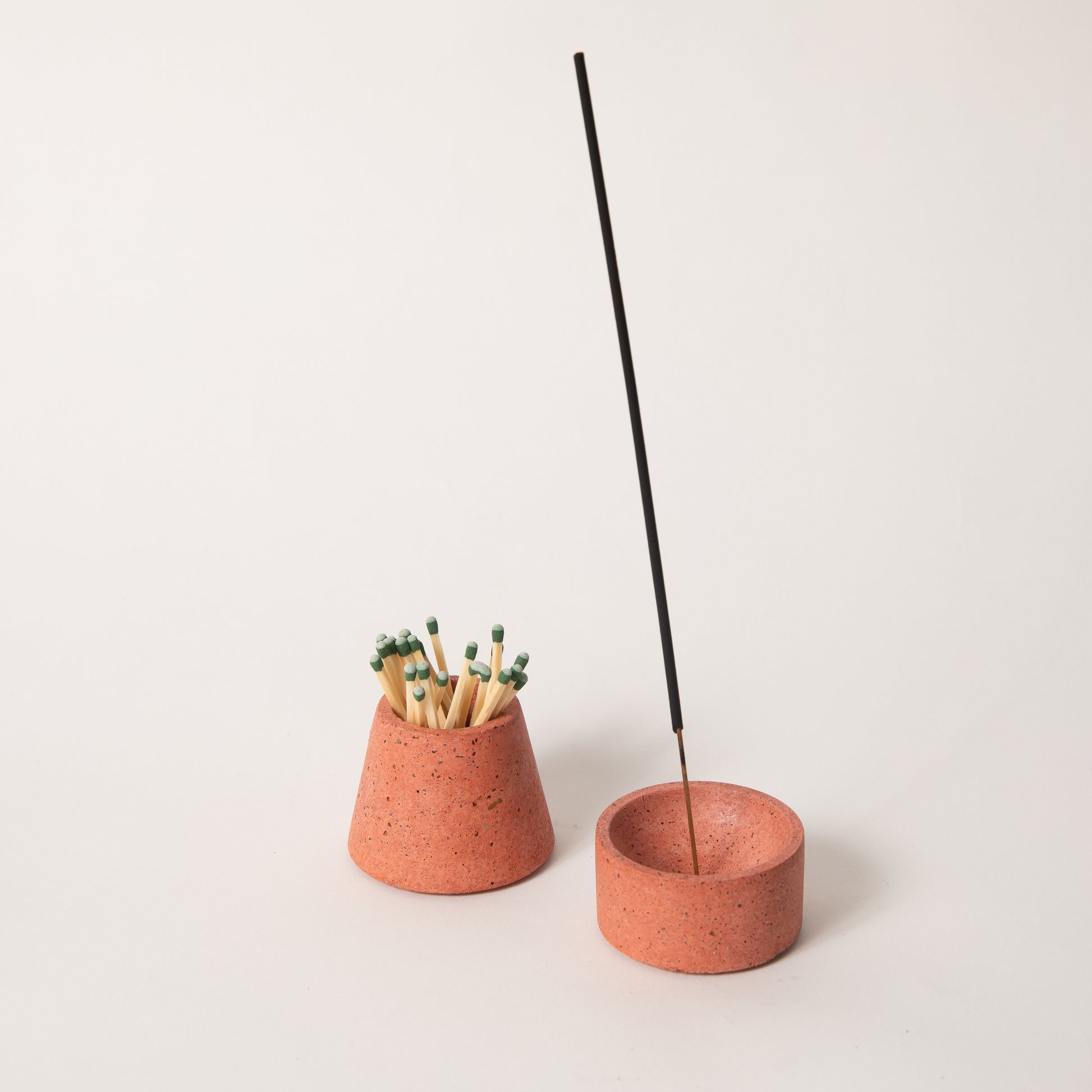 Coral terrazzo matchstick & incense holder set, styled with strike-anywhere matches & an incense stick.