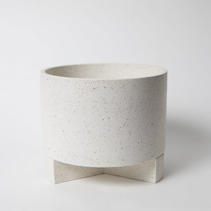 Large size concrete planter with base in white terrazzo.