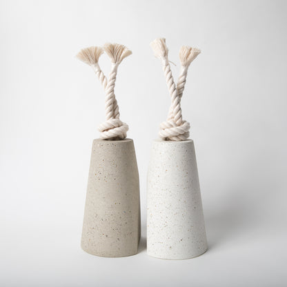 Concrete terrazzo doorstop with cotton rope in both colors side by side.