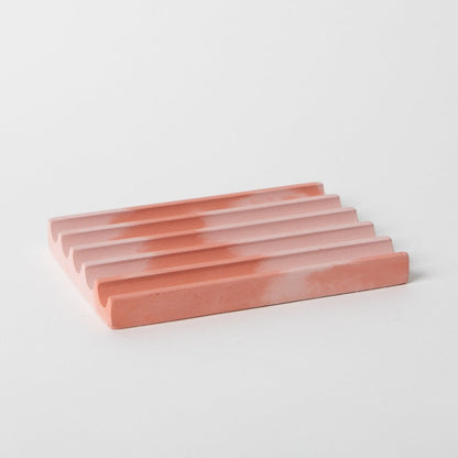 Concrete soap dish in pink and coral.