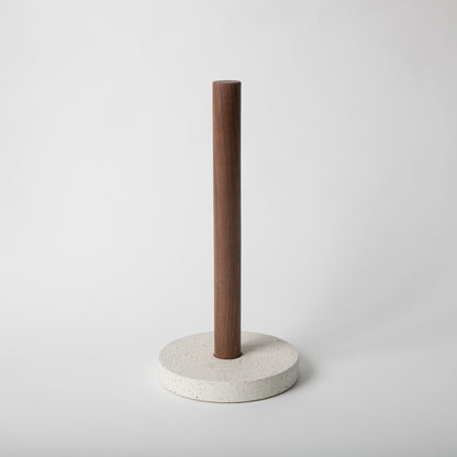 Concrete terrazzo paper towel holder in white terrazzo with walnut rod.